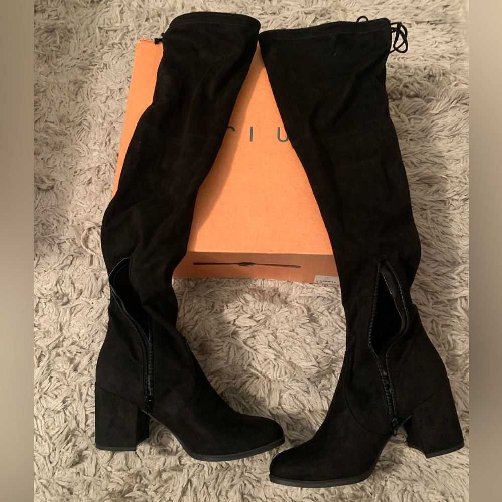 Black thigh high boots